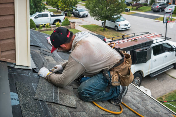 Professional Flat Roof Repair technician working in Johnson, VT
